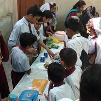 Students presenting creative exhibition projects