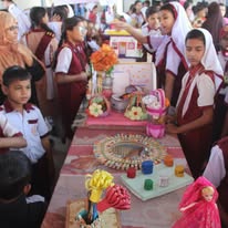 Students presenting creative exhibition projects